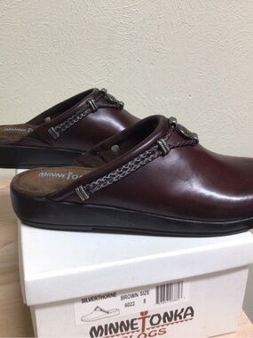 Minnetonka Brown Leather Slip-on shoe with Braided Strap.